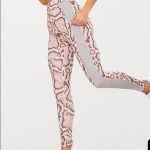 Pretty Little Thing snakeskin leggings.